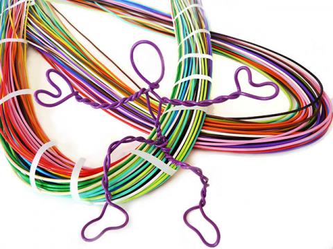 colored craft wire with small person sculpture