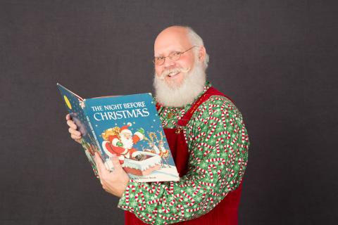 santa reading book