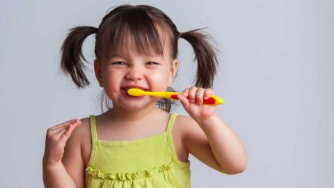 kid brushing teeth