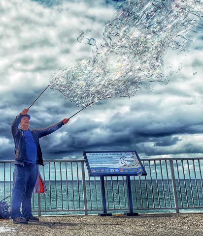 steve alan with a bubble wand