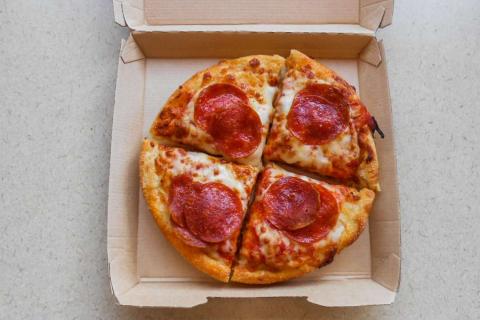 image of pizza in a box