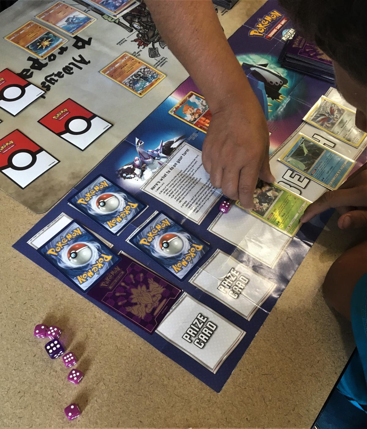 children playing pokemon cards