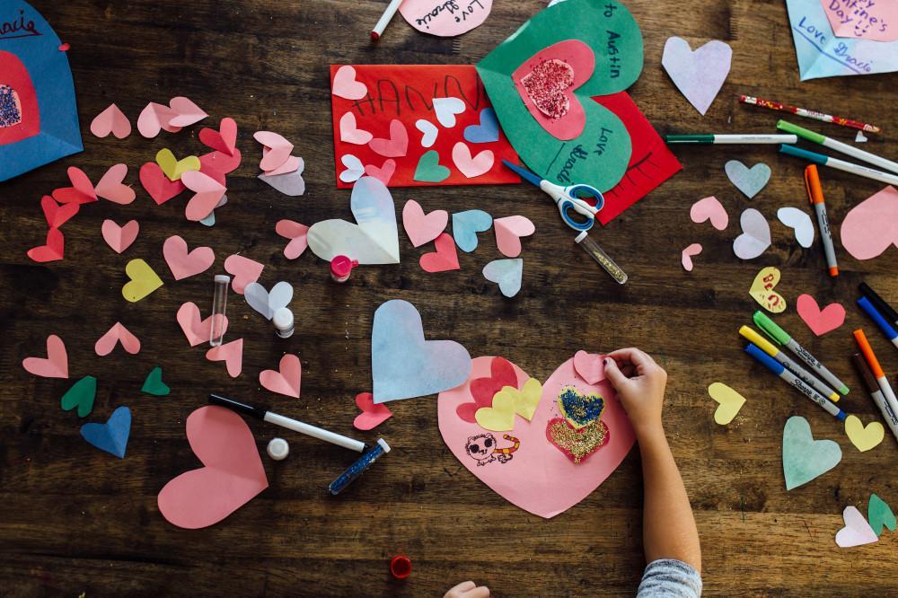 child making valentines