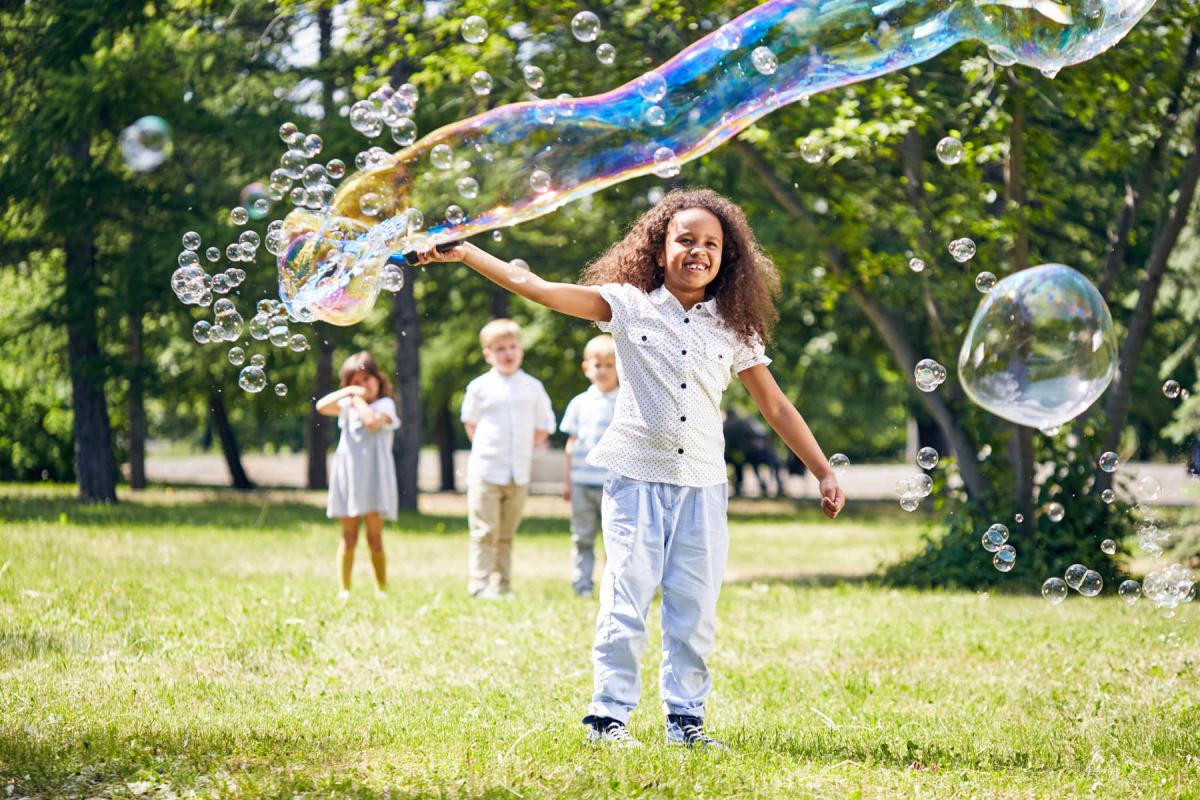 kids playing with bubbles