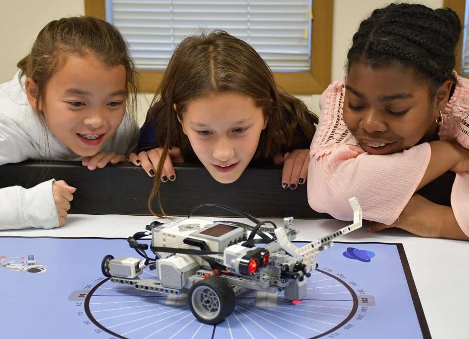 children watching robot